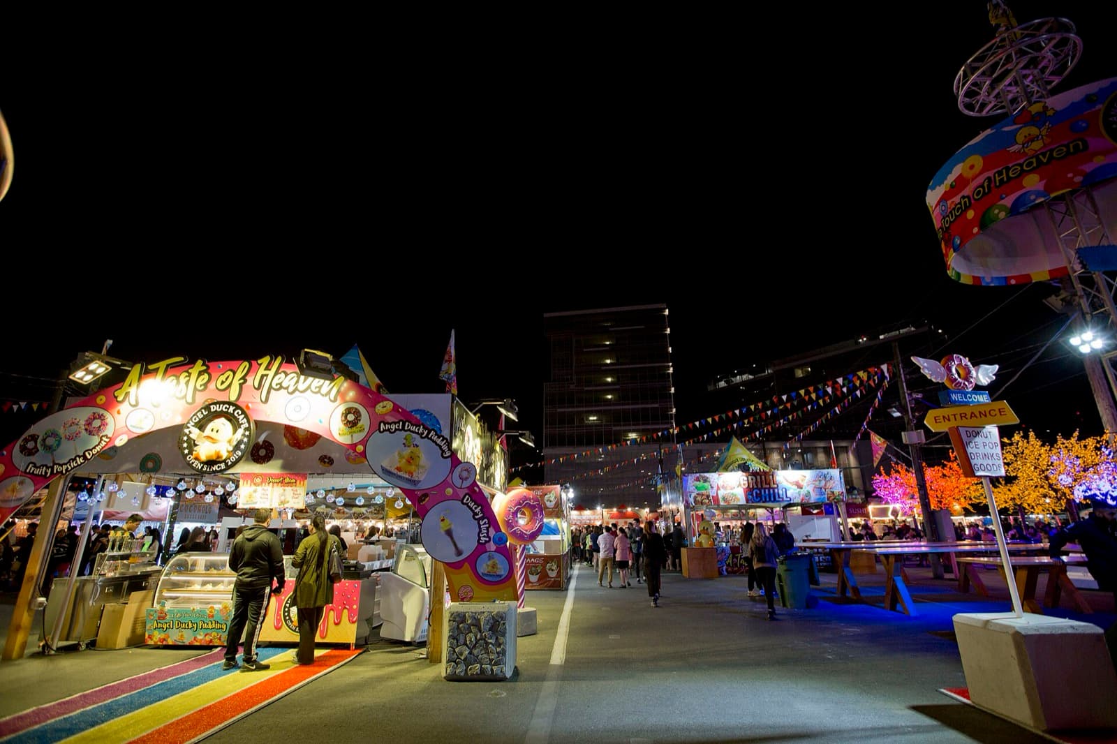 Evening crowds and food stalls at the Richmond Night Market in British Columbia